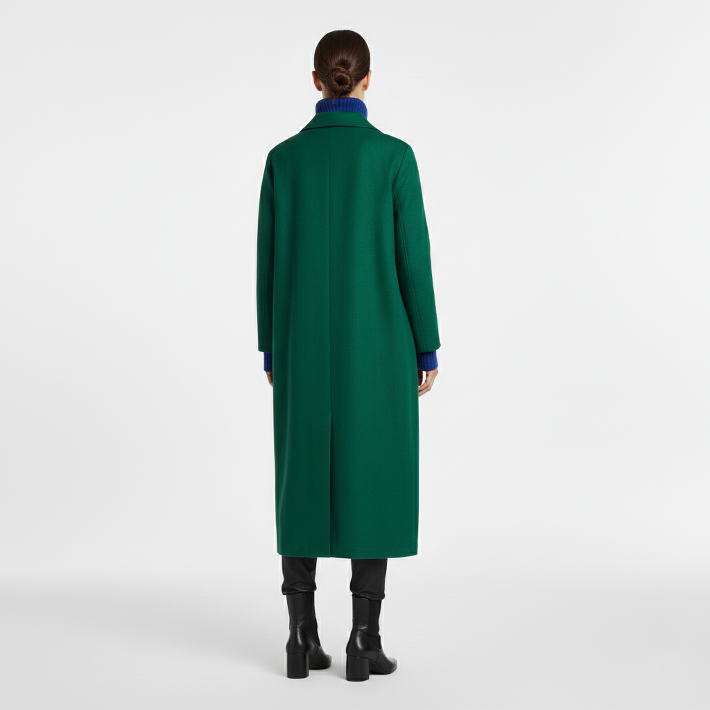 Back view of a long emerald green tailored coat with a back vent