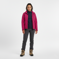 Front view of a pink softshell jacket worn open over a navy half zip fleece